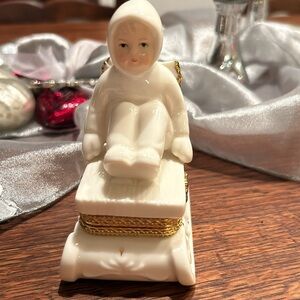 Vintage Angel in Sleigh Porcelain Trinket Box
Formalities Collection
Braun Bros.